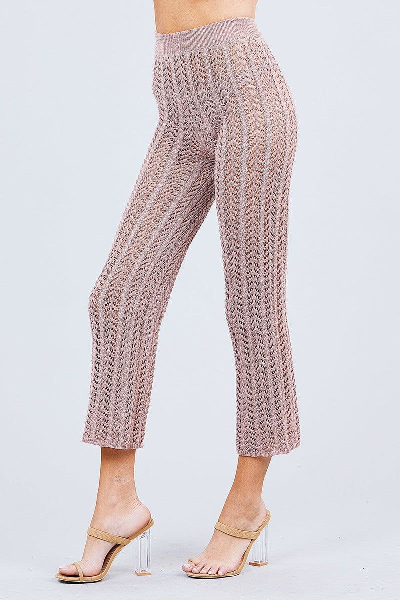 Blush fishnet sweater pants with wide flare legs and ribbed waistband