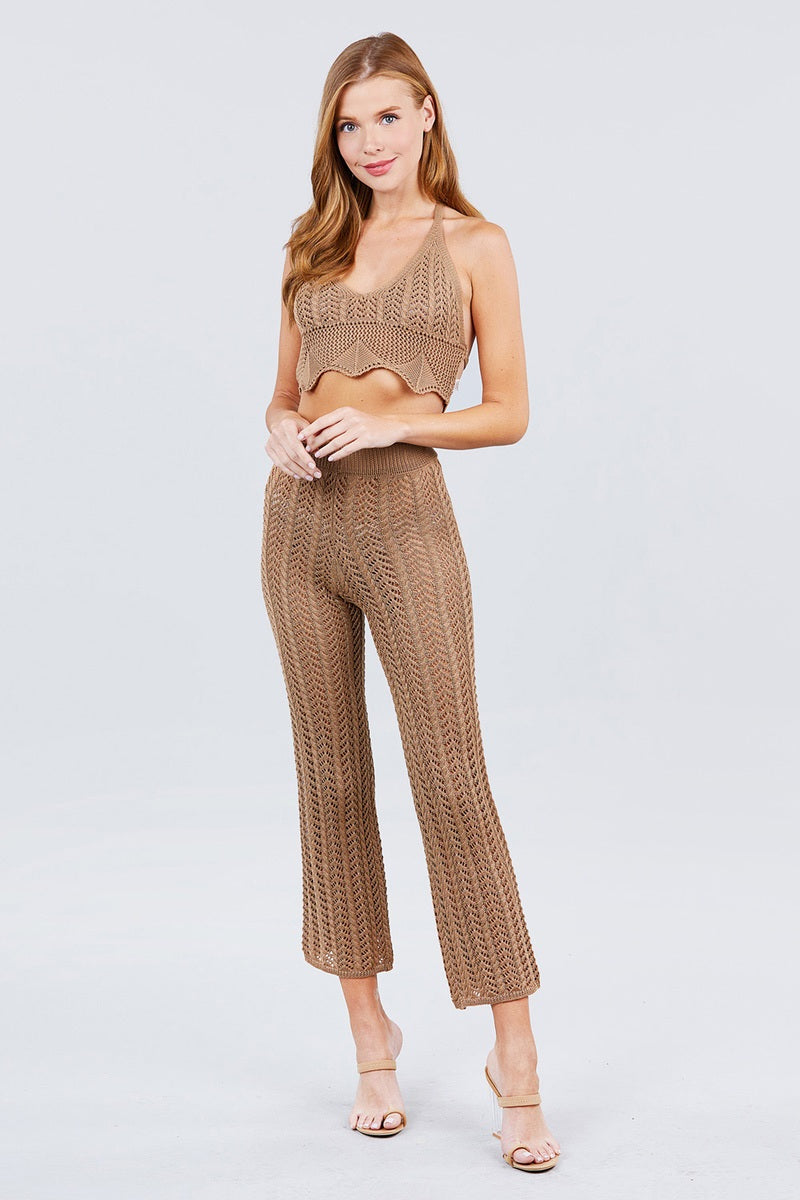 Khaki long fishnet sweater pants with wide flare silhouette and ribbed waistband
