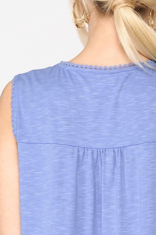 Back view: denim blue sleeveless tunic with lace-trim yoke