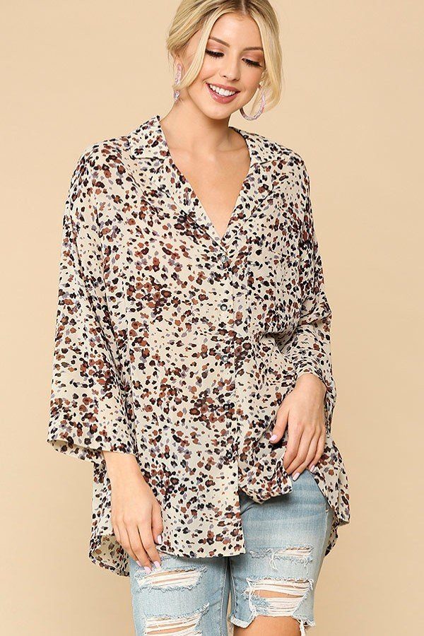 Cream animal print button-down shirt with lapel collar and chest pocket