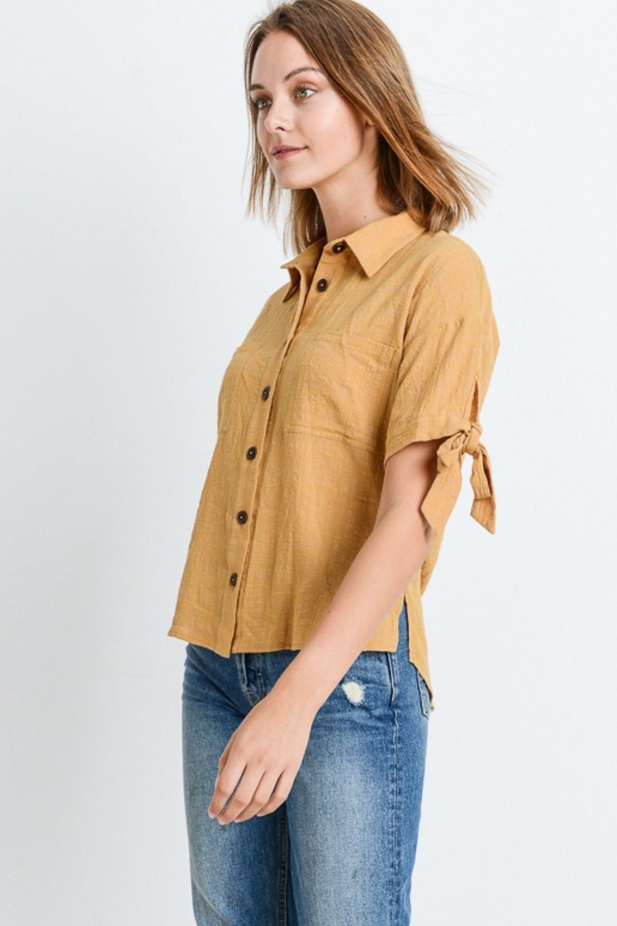Short-sleeve button-up shirt with tie cuff detail and front button placket