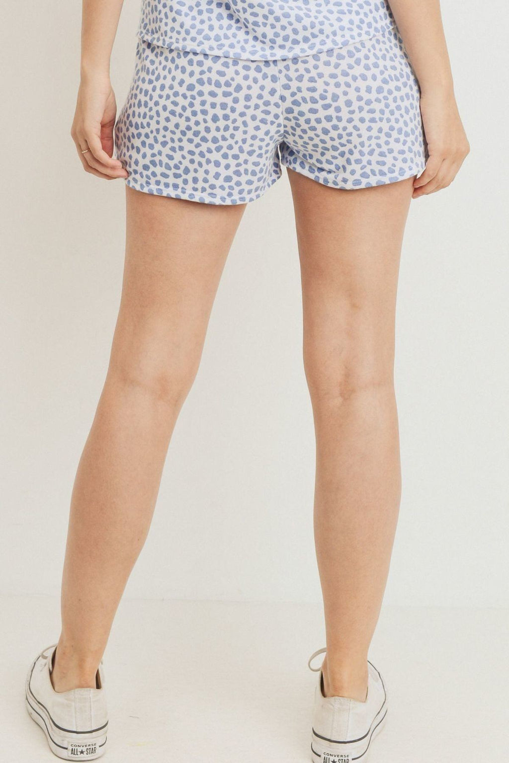 Leopard print terry short pants, light blue allover spots, above-knee straight hem