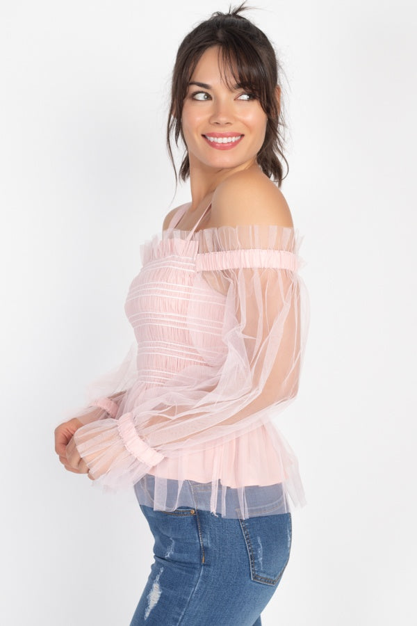 Pink sheer mesh off-shoulder top with elastic neckline and layered ruffle detail at waist