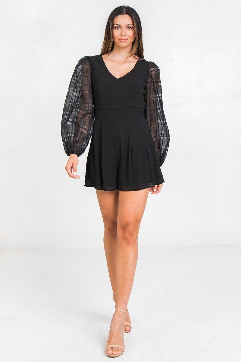 Black V-neck romper with gathered waist and sheer plaid long puff sleeves