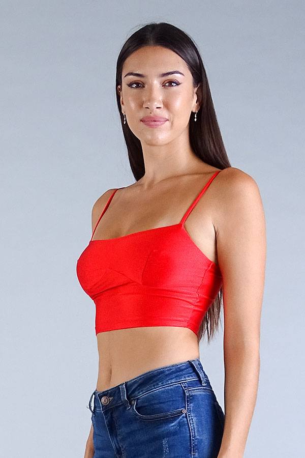 Red darted under-bust crop top with thin spaghetti straps, side torso view