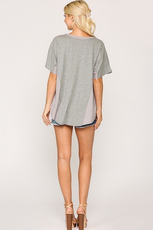 Gray rib knit dolman sleeve top with round hem, back view