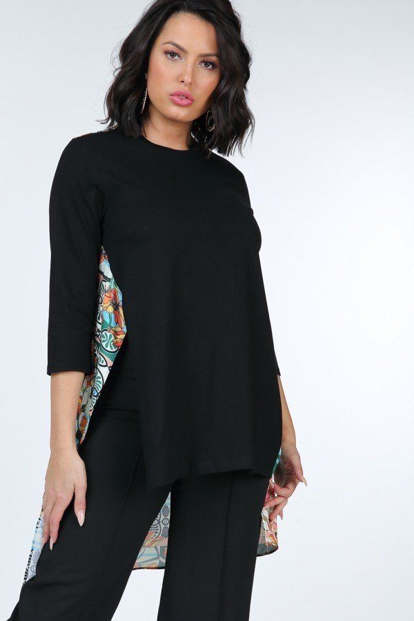 Asymmetrical print high-low top with black front and colorful floral patterned side hem