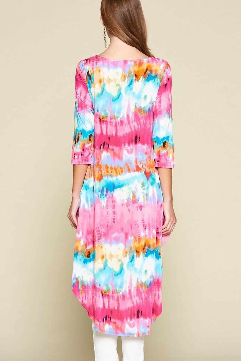 Back view: pink, blue, and orange tie-dye high-low top with 3/4 sleeves