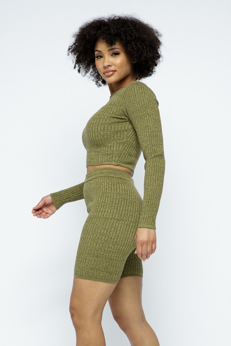 Olive knit long-sleeve cropped top and matching high-waist biker shorts, side view