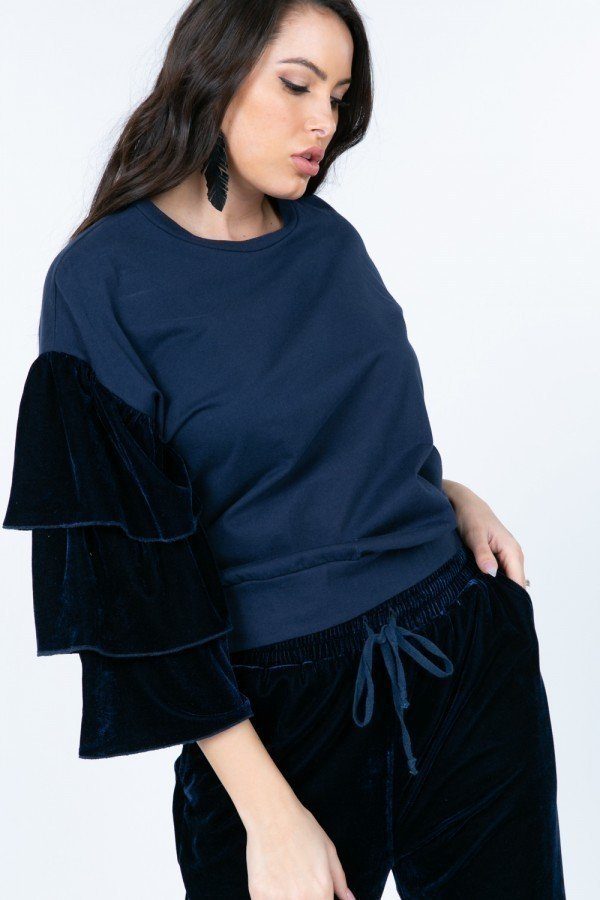 Navy crewneck pullover with tiered velvet ruffle sleeves and draped fit