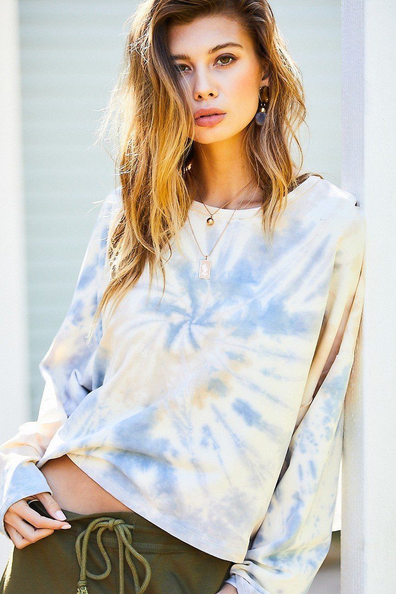 Oversized round-neck crop pullover with blue tie-dye swirls on light French terry
