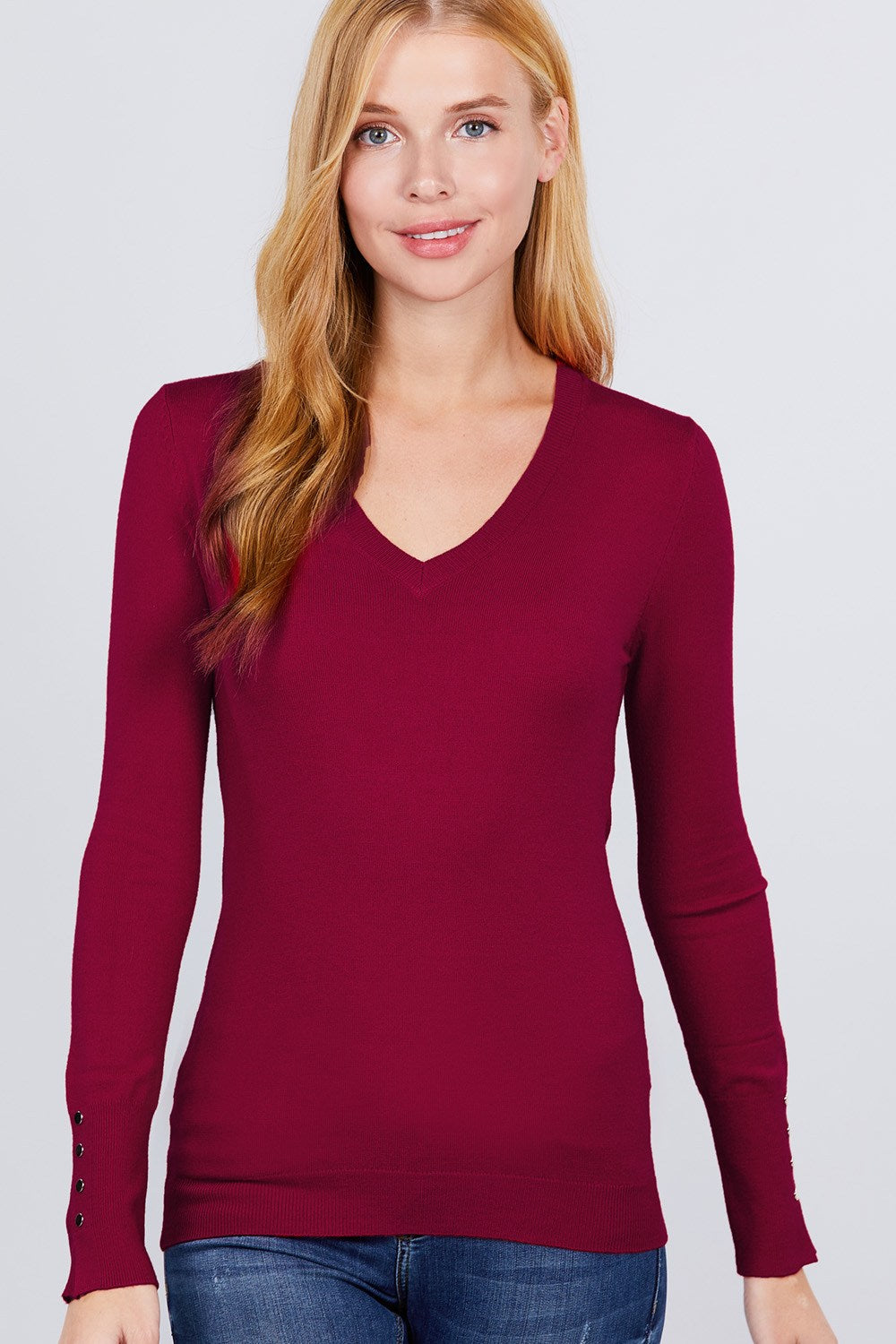 V-neck sweater, bordeaux knit with rivet button detail on left sleeve