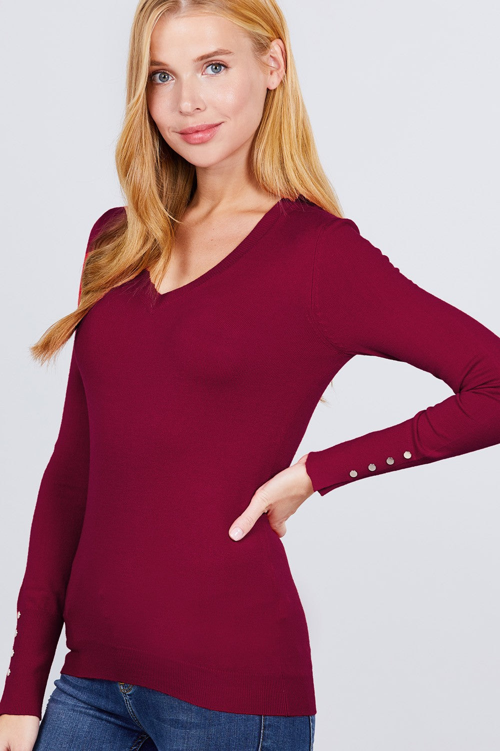 Bordeaux V-neck sweater with rivet buttons along cuff, long sleeves