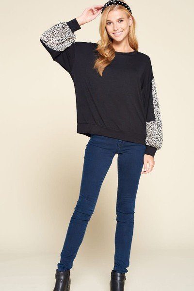 Black jersey casual top with leopard-print cuffs and relaxed fit