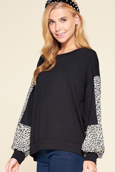 Black casual jersey top with leopard-print bell sleeves and ribbed cuffs