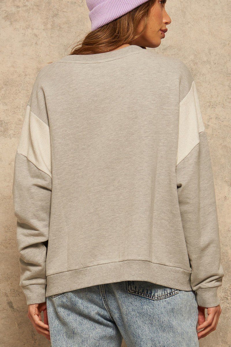 Light gray sweatshirt back view with crew neckline and ribbed cuffs