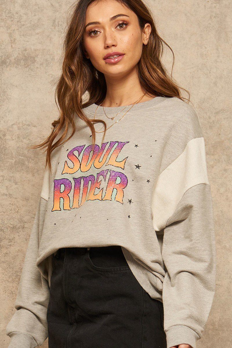 Heather gray sweatshirt with “Soul Rider” multicolor graphic and small star accents