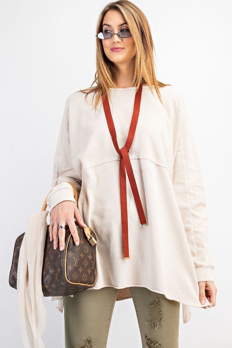 Terry knit tunic with upside-down placket and side slits, off-white and rust trim