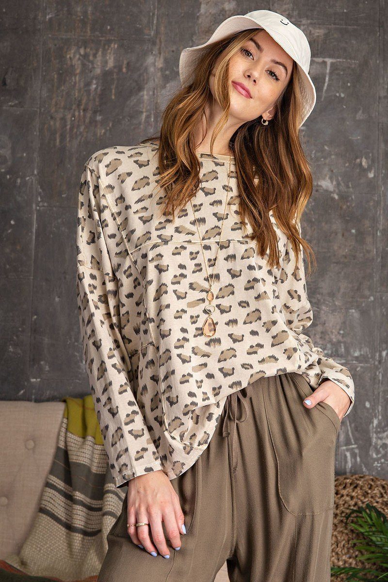 Leopard-print knit top, loose fit, long sleeves; off-white with dark spots