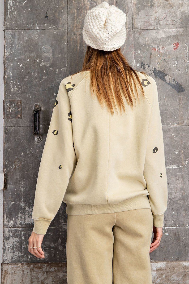 Khaki washed terry sweatshirt, long sleeves, leopard print all over, back view