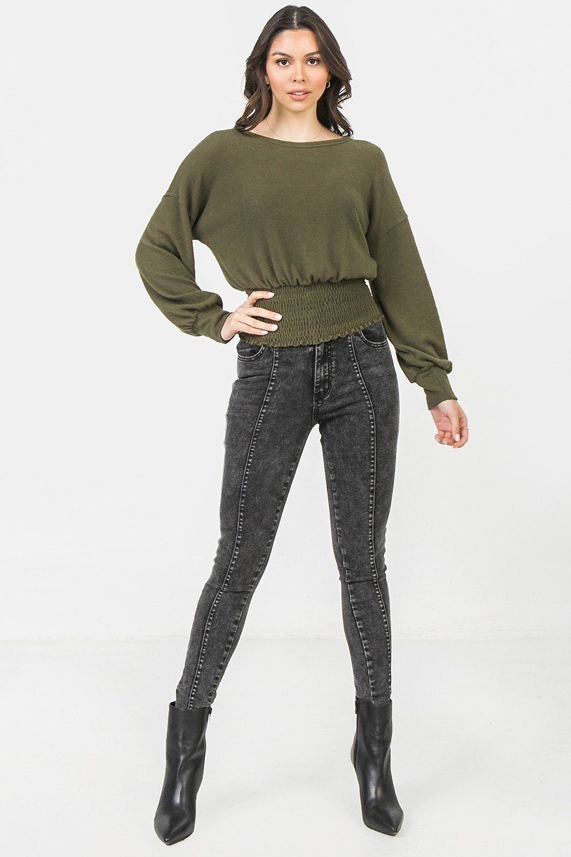 Olive wide-neck knit top with gathered smocked hem and loose long sleeves