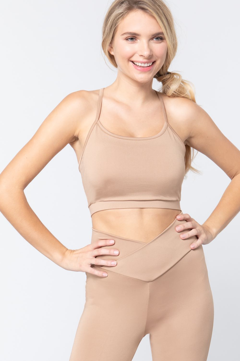 Workout cami bra top in tan with racer back straps and supportive band