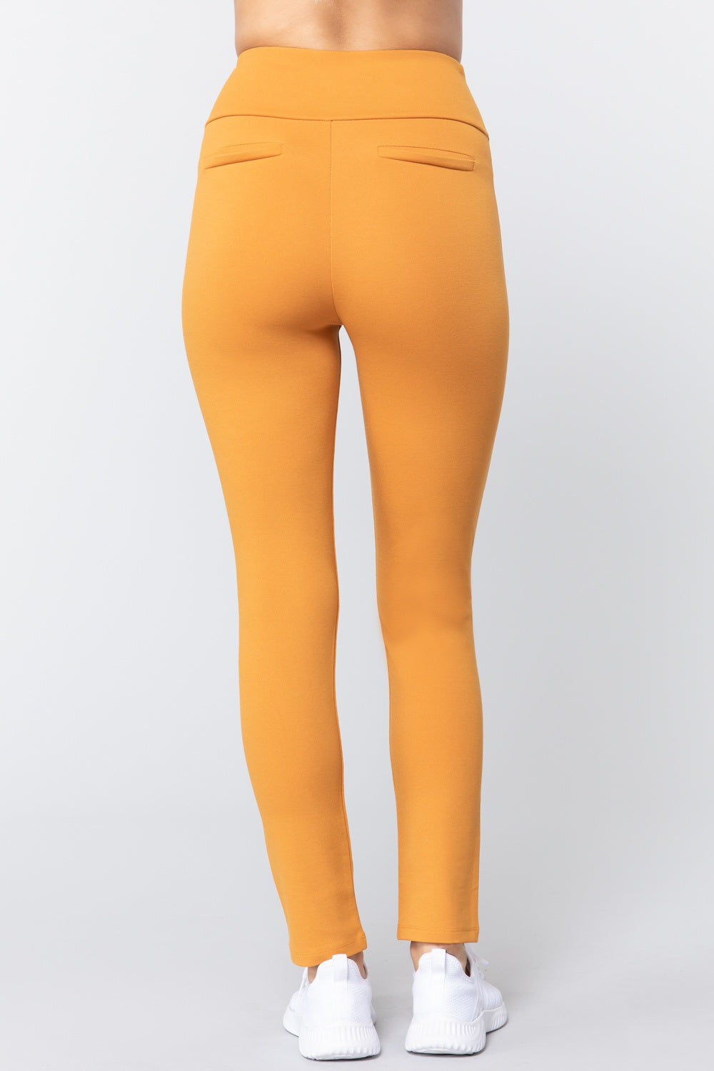 Deep Mustard waist band long ponte pants, back view with stitched seams and tapered fit