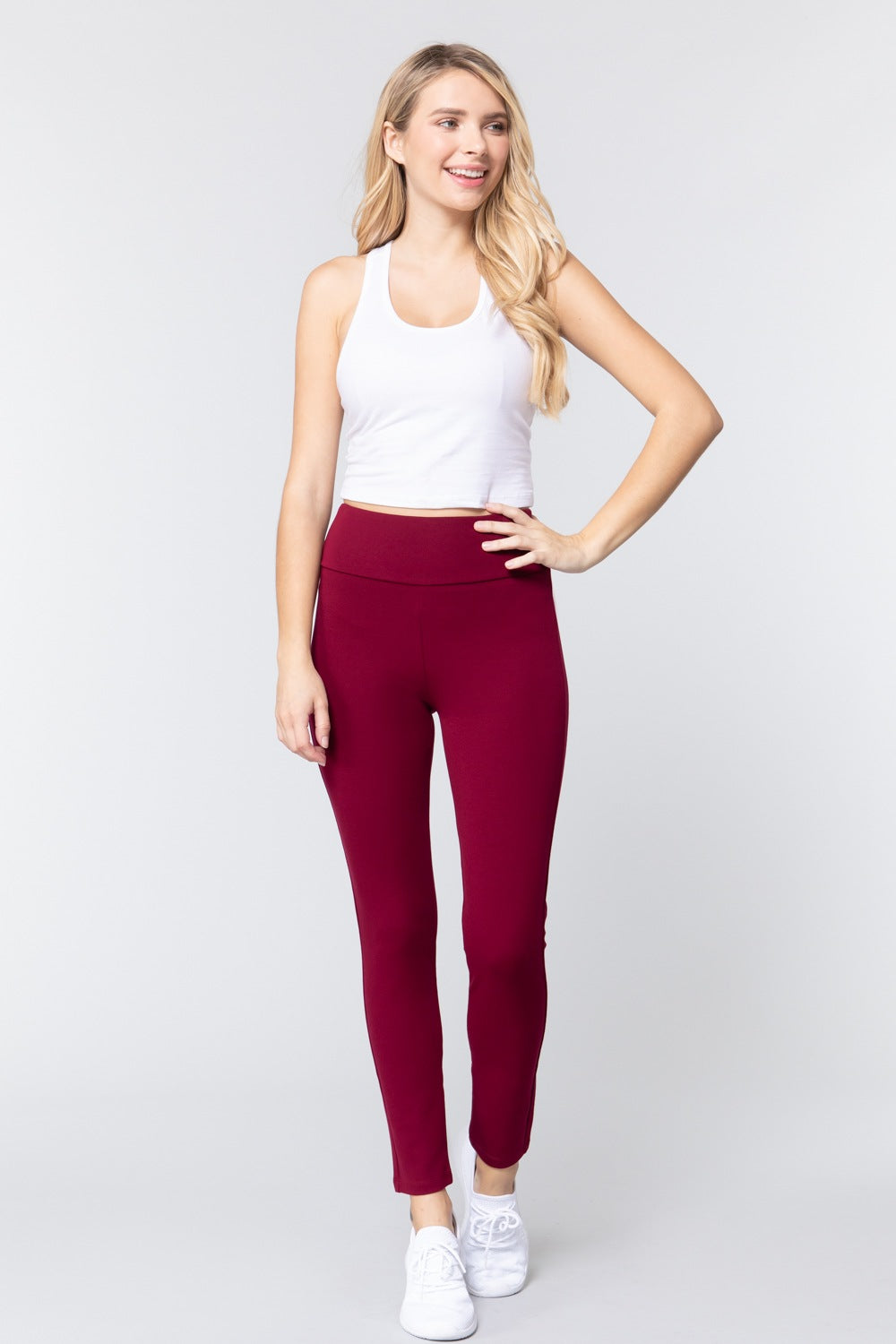 Burgundy long ponte pants, front view with wide waistband and ankle-length legs