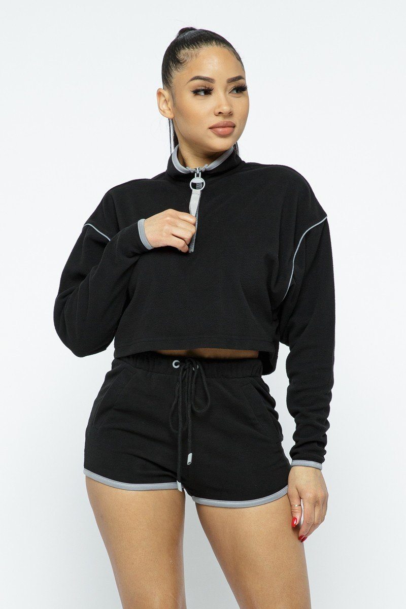Black sporty crop top and high-waist shorts set, zip collar and drawstring waist