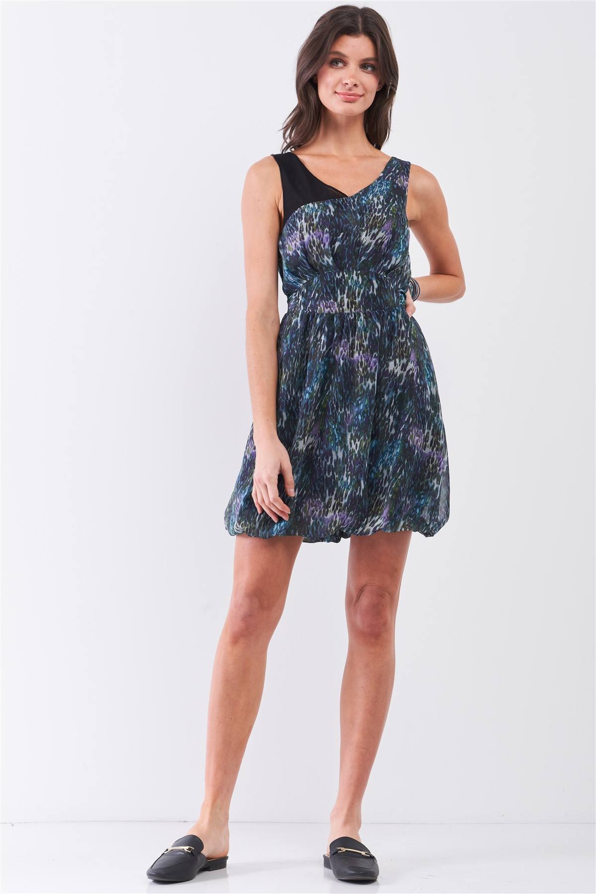 Printed sleeveless mini dress with gathered waist tie and black V-neck