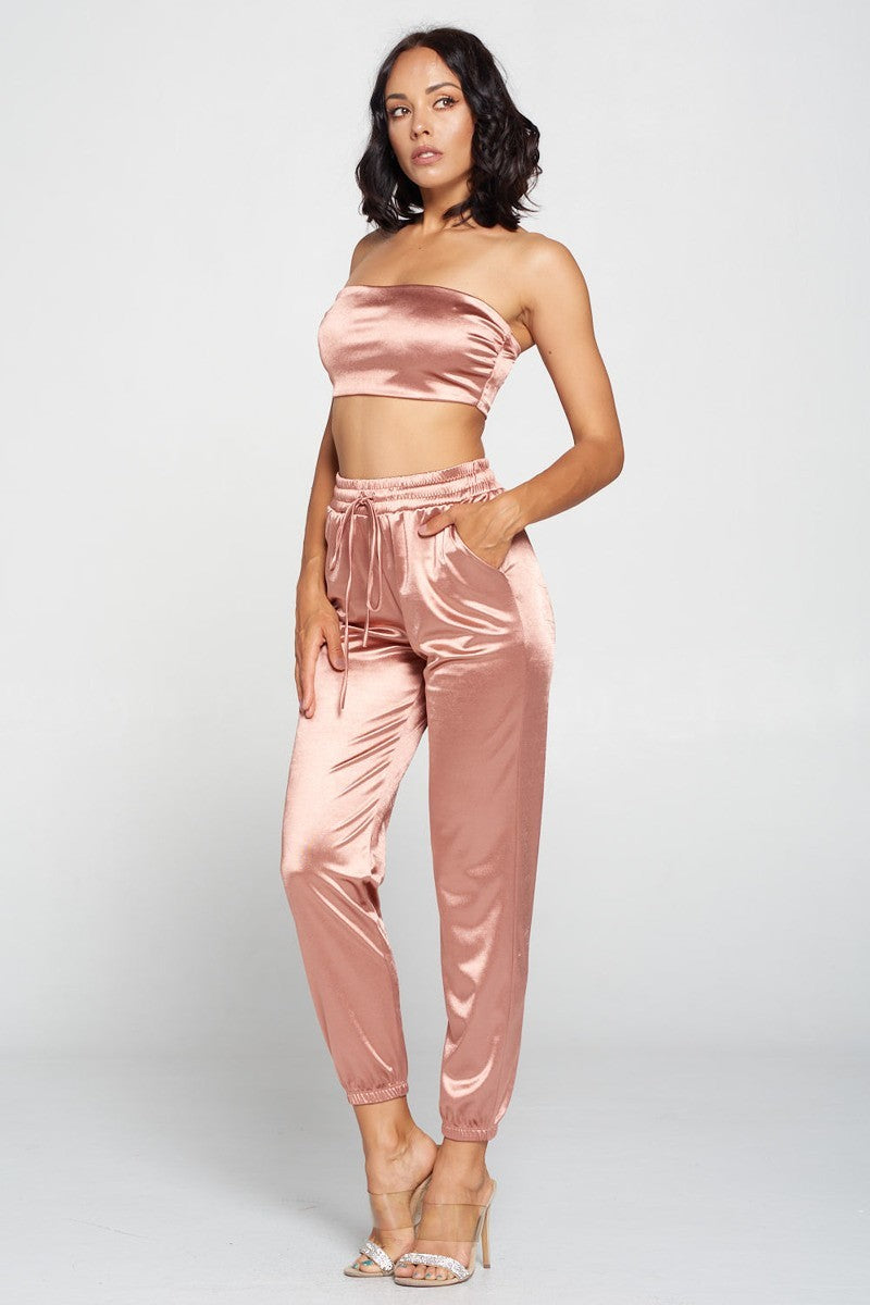 Side view: Mauve satin tube top with matching ankle jogger pants and gathered cuff ties