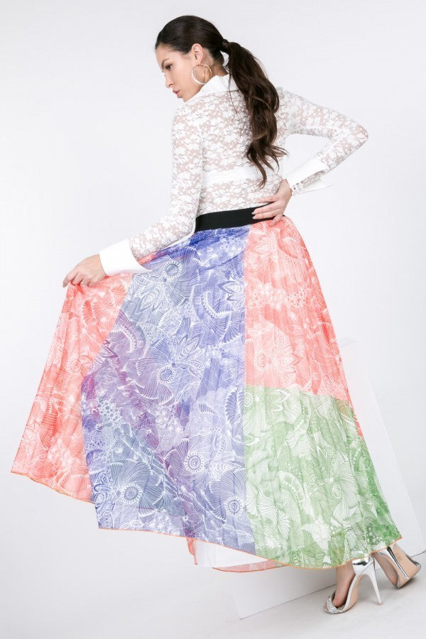 Color block pleated maxi skirt with black waistband and pastel panels in blue, coral, green