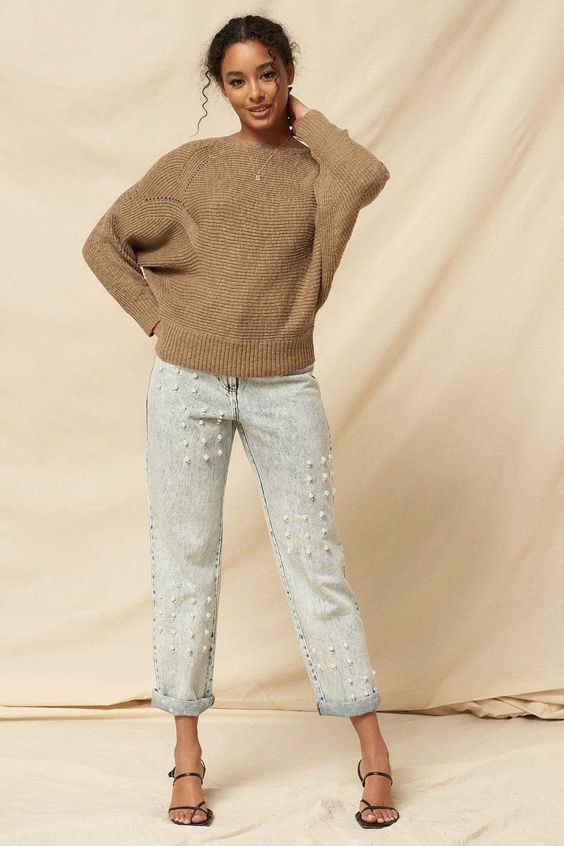 Ribbed knit sweater, tan color with relaxed fit and crew neckline
