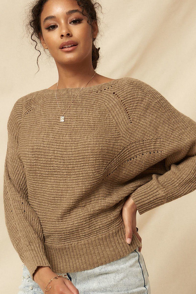Tan ribbed knit sweater with boat neck and small dot detailing on sleeves