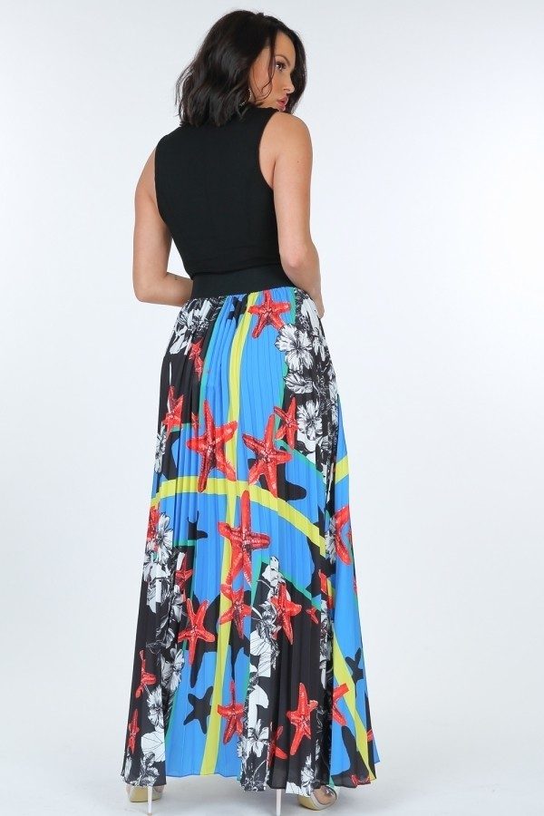Back view: pleated maxi skirt with blue star stripe print and black leather waist belt