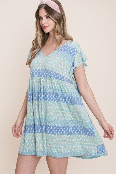 Side view of floral babydoll mini dress, light blue V-neck and short ruffle sleeves