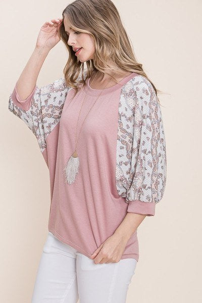 Mauve solid top with gathered floral sleeves and flowing hem