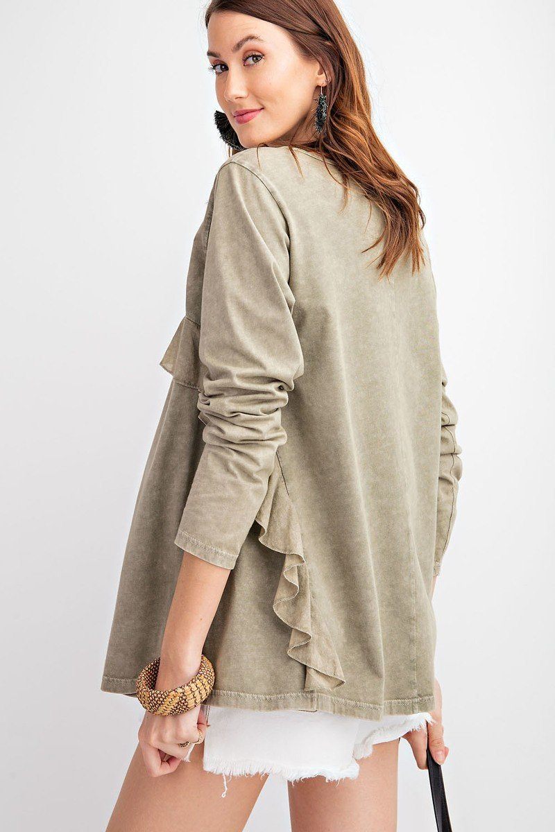 Faded olive long-sleeve knit tunic with ruffle trim at shoulder