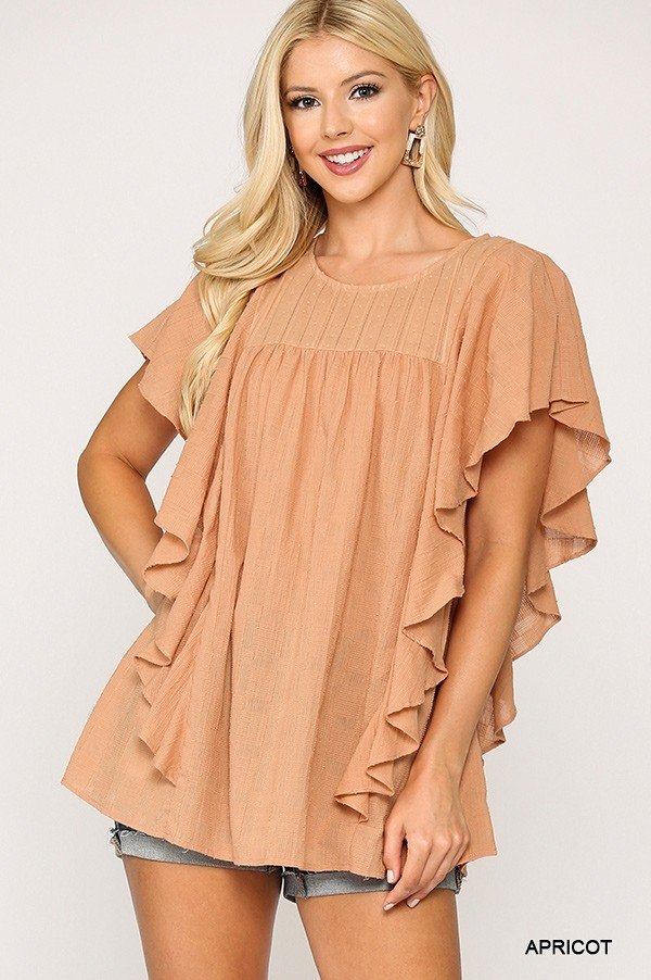 Apricot textured tunic top with ruffled sleeves and pleated front