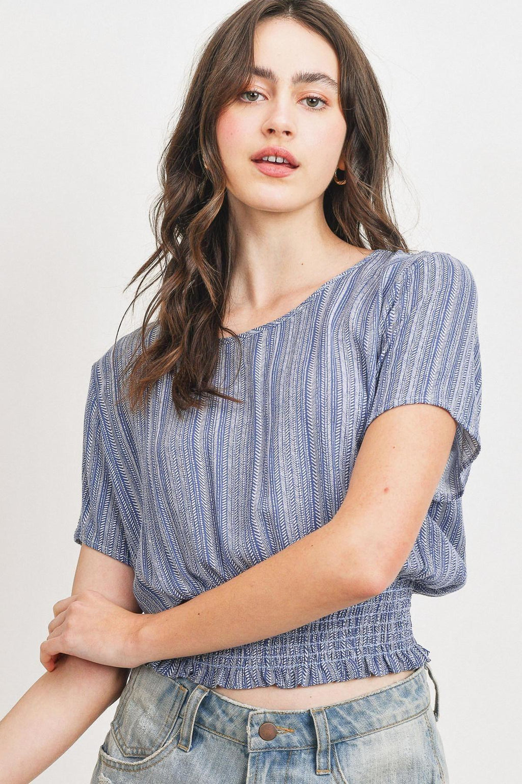 Woven printed crinkle gauze top with waist smocking and short sleeves, blue