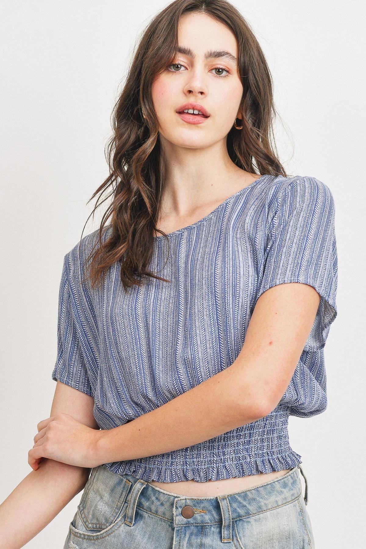 Woven printed crinkle gauze top with waist smocking and short sleeves, blue