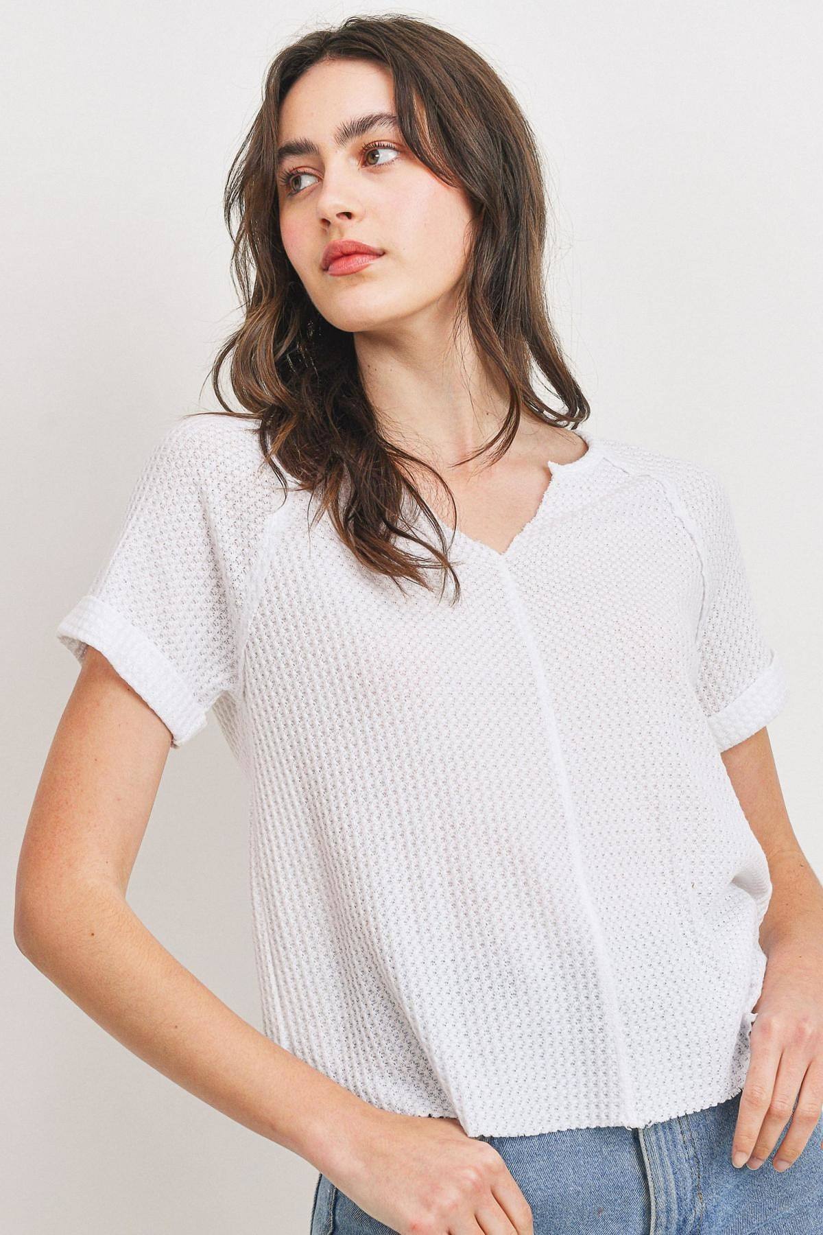 Waffle-knit V-neck short-sleeve top, raw edges, rolled cuff sleeves in white