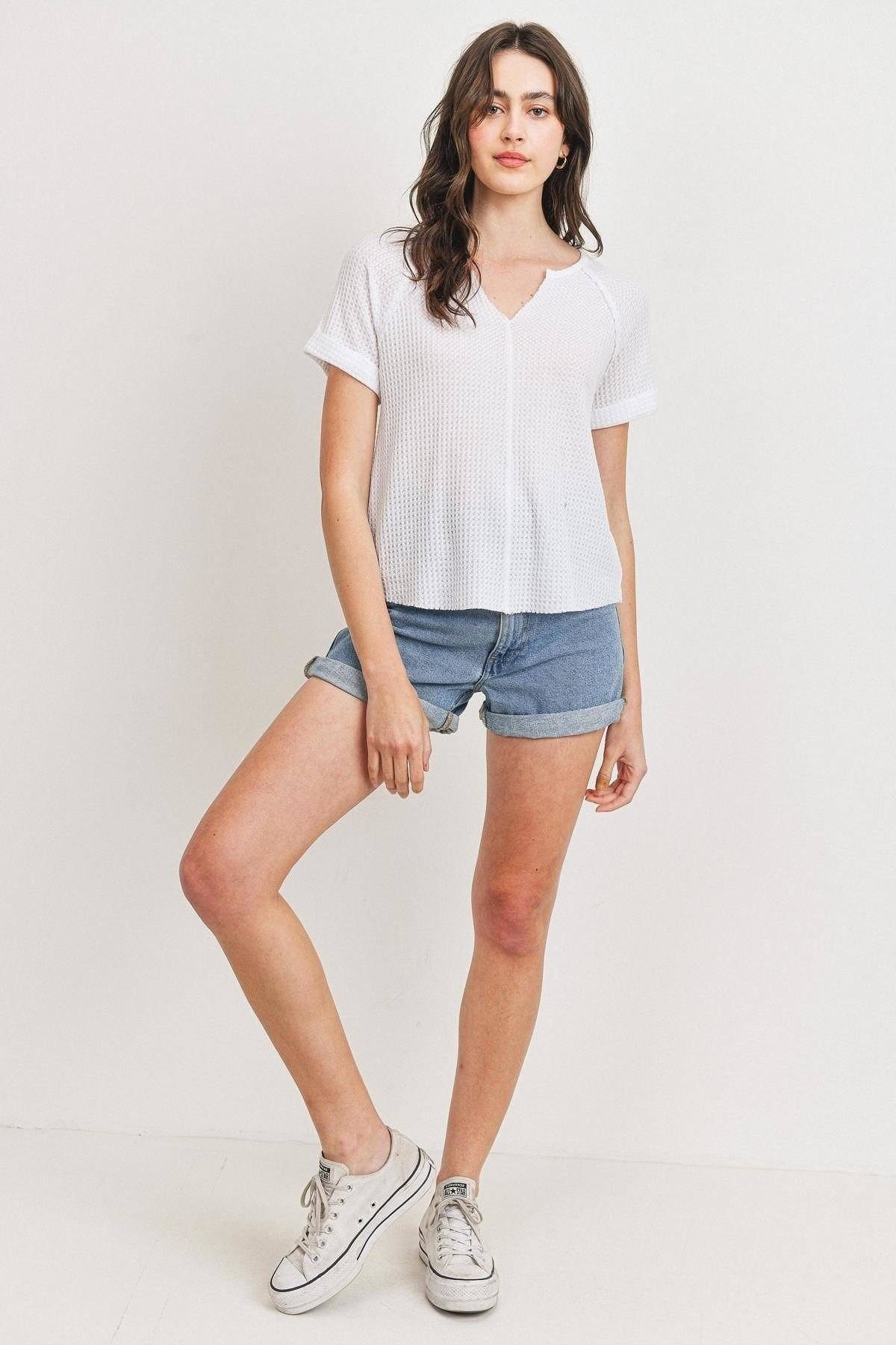 Waffle V-neck short-sleeve top with rolled cuffs and raw hem, white