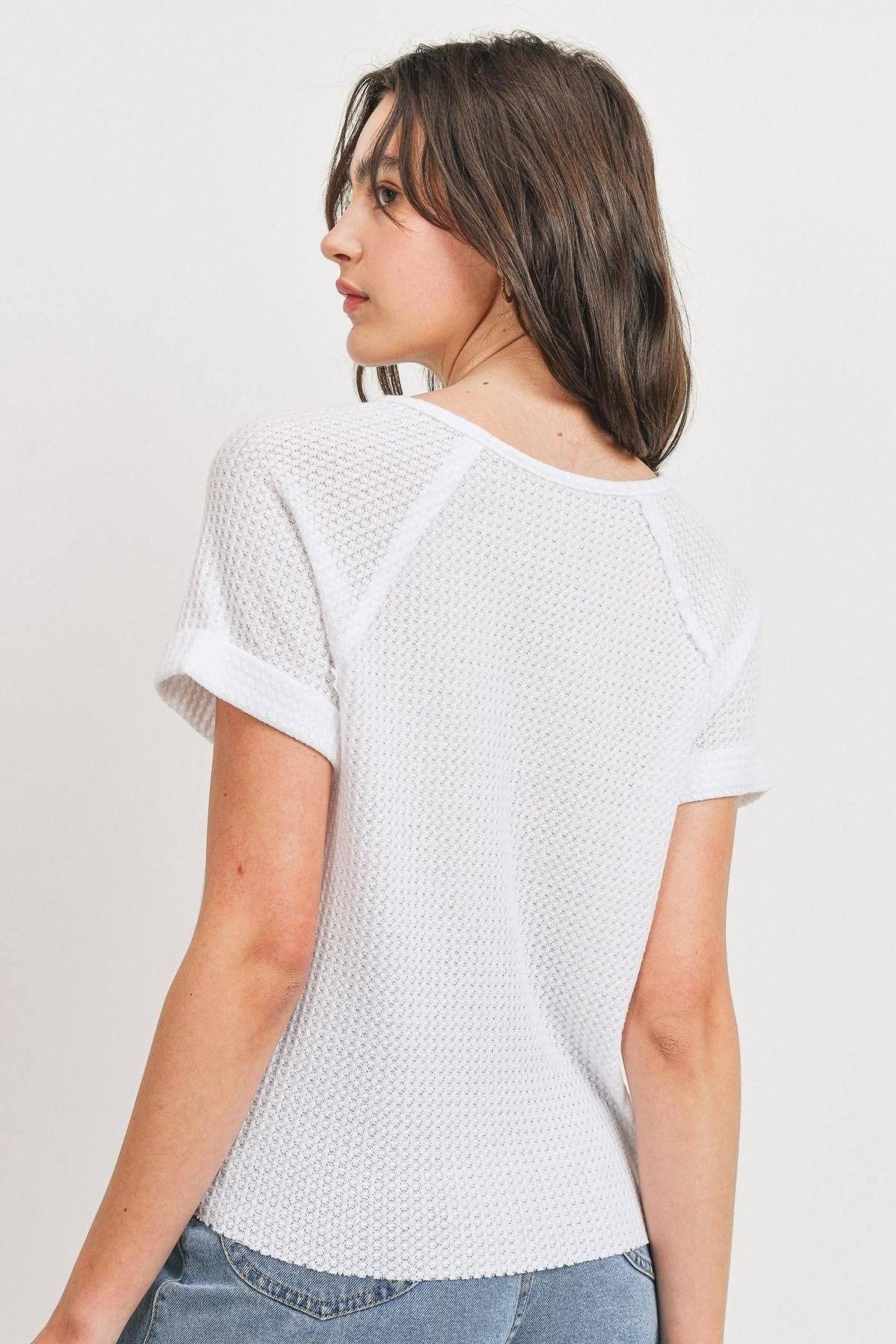Waffle-knit V-neck short-sleeve top, white, with raw-edge hem and back seam