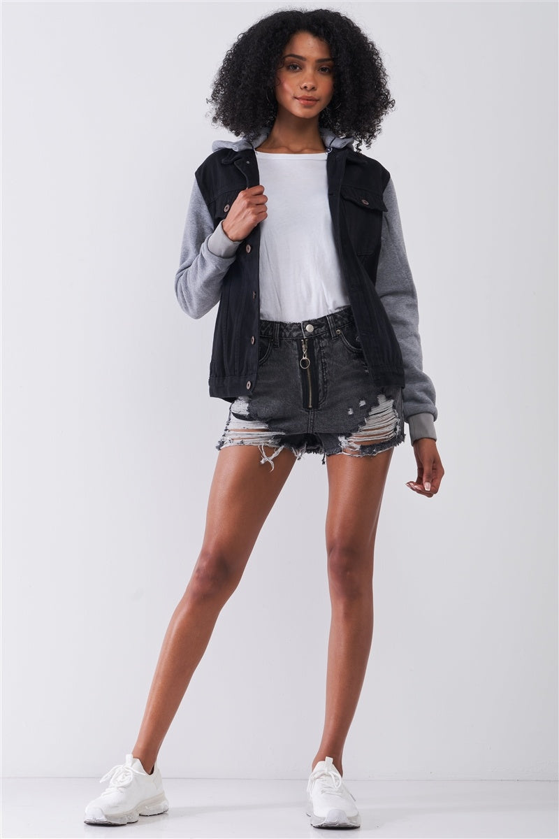 Black high-waist zip mini shorts with ripped raw hem and light distressing