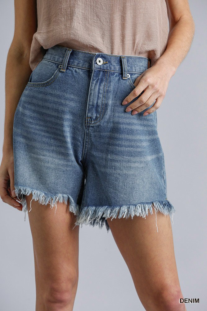 High rise denim shorts with raw frayed hem and button front