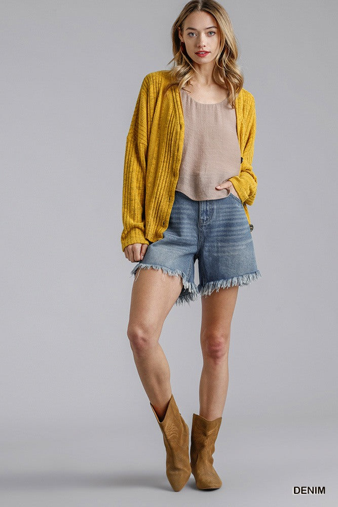High rise denim shorts in light wash with raw frayed hem