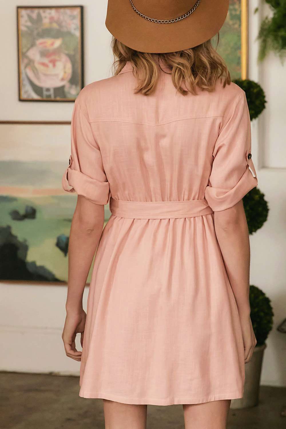 Dusty pink drop-shoulder belted dress back view with gathered waist and cuff sleeves