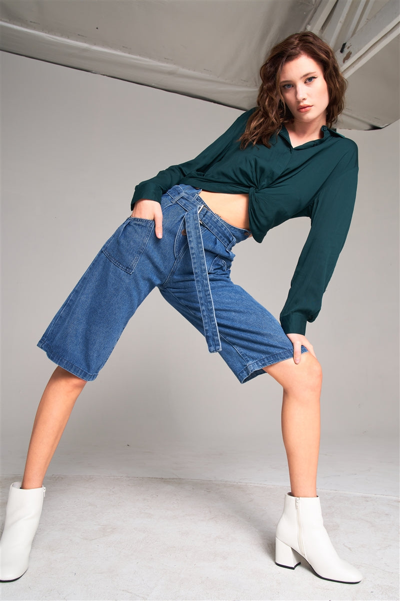 Mid blue denim high-waist flare jeans with buckle and self-tie belt detail