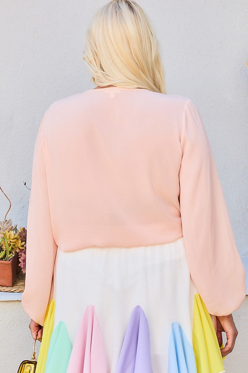 Blush pink back view V-neck bubble-sleeve solid top with drawstring waist